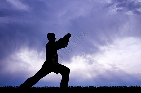 日落时少林空手道娱乐保卫攻击力闲暇运动纪律武术艺术防御背景图片