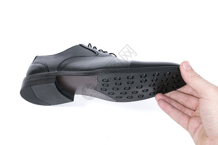 白色背景的黑皮鞋 孤立的产品 笑声女性运动男人鞋类时尚蕾丝鞋革商业运动鞋皮革背景图片