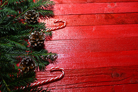 美丽的圣诞节装饰品卡片杉枝季节性枝条庆典边框贺卡木头装饰风格背景图片