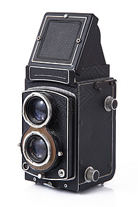 白色背景的老旧相机概念镜片照片倾斜背景图片