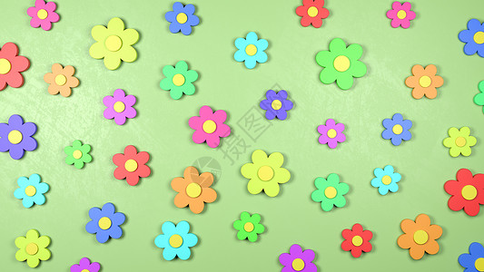 绿色背景上的五颜六色的花朵形状背景图片