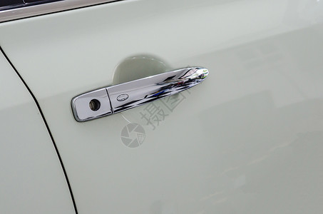 车门把手白色金属安全钥匙反射运动奢华旅行门把手车辆锁高清图片素材