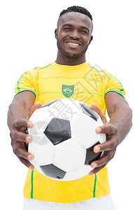 巴西橄榄球运动员的肖像扇子支持者男性黄色运动服足球运动黑色微笑竞技背景图片