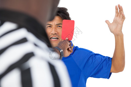向足球运动员出示红卡的被评人红牌男人体育权威裁剪惩罚运动裁判团队黑色运动服高清图片素材