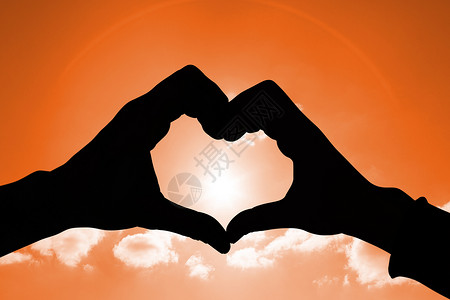 情侣用双手塑造心形的复合图像绘图情怀情人数字阳光夫妻太阳情感红色浪漫多云的高清图片素材