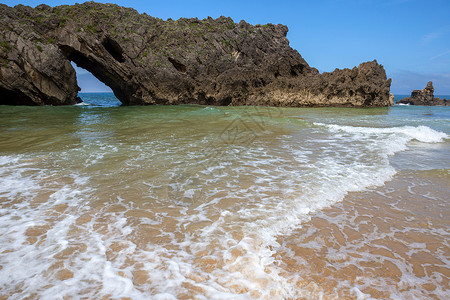 圣安托林海滩海滩旅游石头假期岩石海岸风景洞穴旅行布里科背景图片