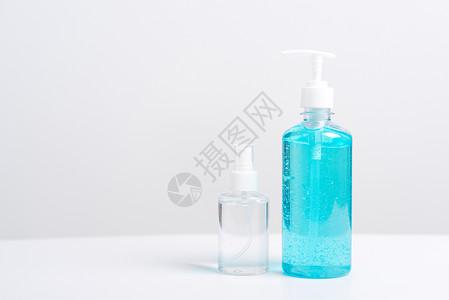 用于洗手的酒精凝胶泵和喷雾瓶肥皂预防防腐剂消毒剂产品细菌塑料卫生蓝色医疗保险背景图片