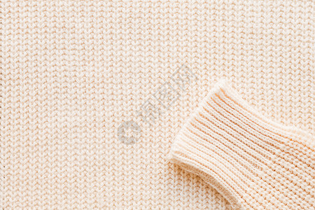 斜编织背景抽象针织的背景 有袖羊毛衫 针织图案的特写图片纺织品织物衣服套衫白色平行线袖子编织宏观羊绒背景