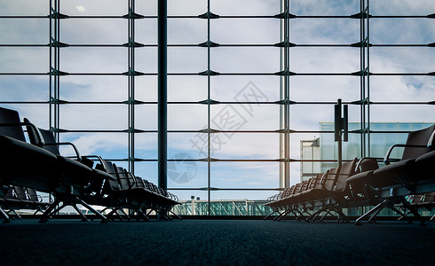 机场贵宾休息室机场候机楼起程休息室的乘客座位贵宾蓝色旅行假期城市玻璃建筑学窗户民众航班背景