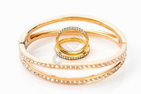 黄金钻石白色背景的黄金结婚戒指金子金戒指夫妻水晶订婚金带新娘钻戒宝石婚姻背景