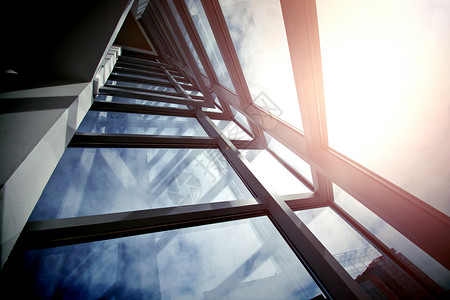高楼窗户现代商业架构财产天空天际中心反射企业成功金融高楼城市背景