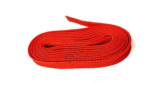 红色的红绳在白色背景上 红色的织物绳折叠在棉布编织尼龙圆圈领带电缆材料针织卷曲绑定背景图片