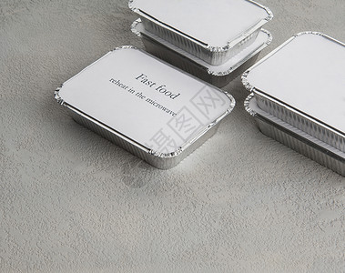 成套快餐食品金属包装微波杯子烤箱送货午餐盘子食物机动性背景