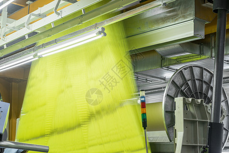 工厂的编织车间植物纤维生产作坊制造业织机纺织品技术筒管纺织厂机械高清图片素材