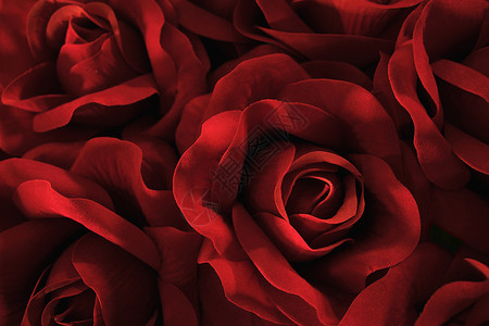红色花花人造玫瑰背景图片