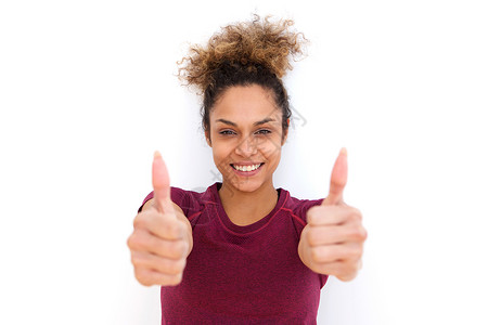 快乐的年轻女子微笑 用拇指举起标志牌幸福高清图片素材