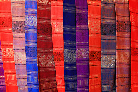 老挝的丝丝围巾背景非常贴近色彩多彩的老挝人背景图片