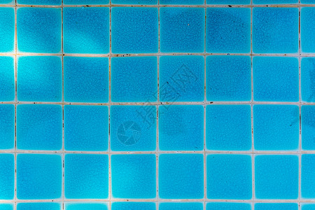 游泳便便的蓝色瓷砖背景图片