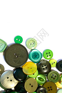 多色不同尺寸按钮的集合维修圆圈工艺绿色衣服纺织品白色纽扣圆形收藏背景图片