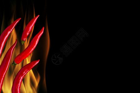 火焰背景上的辣椒/火焰上的辣椒/火焰上的辣椒与背景图片