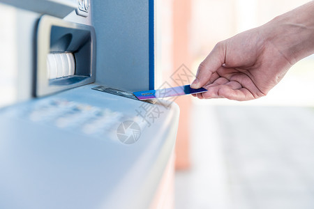 银行信用卡折页用信用卡从自动取款机无线提取背景