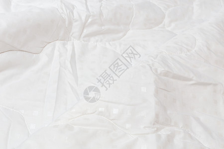 大条羽绒被白色织布毯 一个大折叠封闭背景 有选择性的焦点和背景模糊不清背景