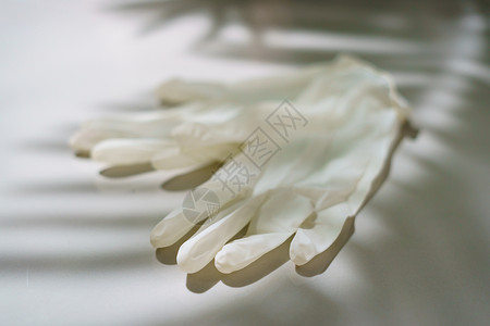 一对白乳胶的医用手套橡皮塑料医院实验室医生安全卫生工作预防保健背景