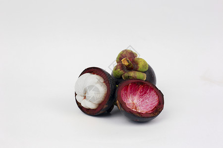 芒果山竹食物紫色市场白色健康山竹果绿色背景图片