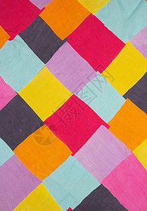 用于背景的彩色织物纺织品碎片粉色墙纸黄色紫色分割下脚料橙子蓝色正方形背景图片