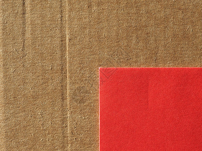 棕色瓦楞纸板和红纸纹理背景背景图片