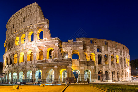罗马日出时的巨石之景 意大利 欧洲纪念碑拱门历史石头文化帝国太阳旅游天空竞技场背景图片