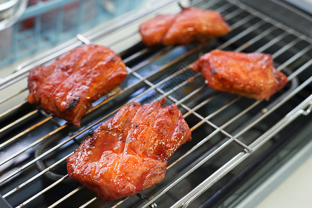 泰国红BBQ猪肉或中国式烤猪肉文化食物美食背景图片