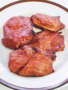 泰国红BBQ猪肉或中国式烤猪肉文化食物美食背景图片