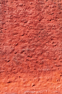 老红色被风化的粗砺的墙壁纹理石膏建造业红墙石工建筑学水泥建造苦恼石头砖墙背景图片