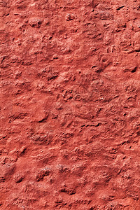 老红色被风化的粗砺的墙壁纹理石头建筑学砖墙红墙石膏摄影石工材料建筑水泥背景图片