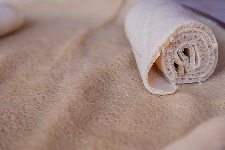 Injera 埃塞俄比亚的主食饼子画眉食品食物面粉美食面包文化盘子背景图片