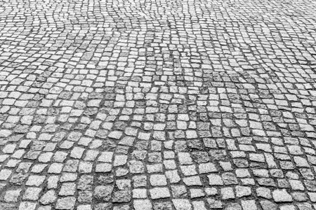 花岗岩纹理老路面马赛克小路人行道岩石黑色正方形灰色材料地面街道背景图片