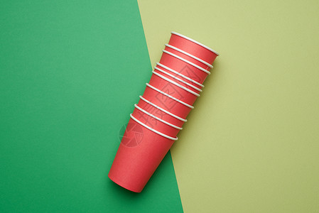 绿色背景 平面一格的红纸可一次性杯背景图片