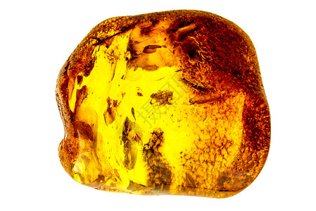 闭着的琥珀石矿物生物学化石宏观橙子黄色白色夹杂物水晶树脂背景图片