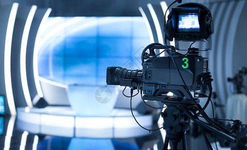 录像摄影机     电视演播室录制节目照明新闻相机广播信息媒体舞台布景设备背景图片