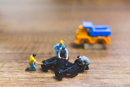 修理卡车车轮的工人 17  18 6数字工作运输玩具建造机器工业宏观男人维修背景图片