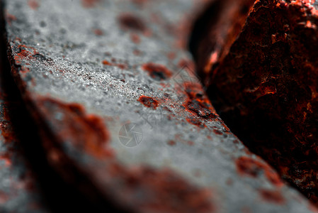 旧钢铁合照火山黑色岩石石头矿石金属红色宏观材料背景图片