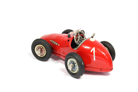 白色背景的老旧古典玩具铁赛车速度红色公式车轮乐趣驾驶运输汽车发动机收藏品背景图片