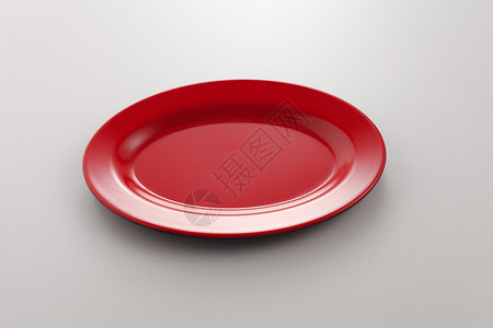 红色车牌红色影棚用具水平盘子椭圆形对象摄影厨房背景图片
