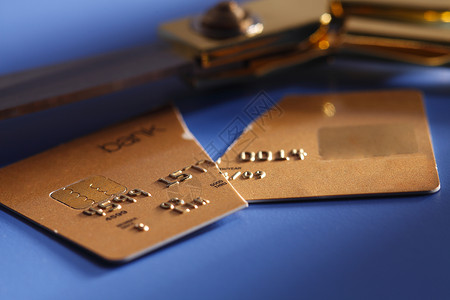 信用卡剪刀彩色水平影棚蓝色破坏背景债务摄影背景图片