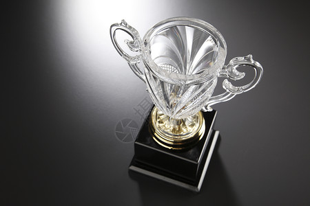 水晶奖杯玻璃庆典杯子竞赛胜利冠军优胜者金属背景图片