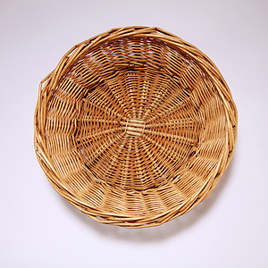 圆形状篮子乡村工艺手工圆圈木头制品白色圆形棕色柳条背景图片