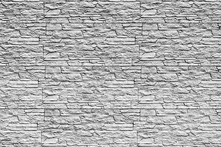 砖纹墙纸素材黑色和白色的墙纹 上面盖着装饰砖块花岗岩水泥长方形建筑学接缝马赛克建筑石墙石头制品背景