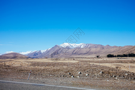 Tekapo湖路 新西兰地貌景观岩石运输驾驶日光天空旅行爬坡蓝色环境旅游背景图片