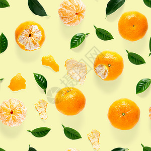 普通话无缝图案 橘子和克蕾婷 用绿色叶子隔离在黄色背景上 收集完好的无缝图案情调柑桔食物热带收藏水果墙纸模式橙子作品背景图片